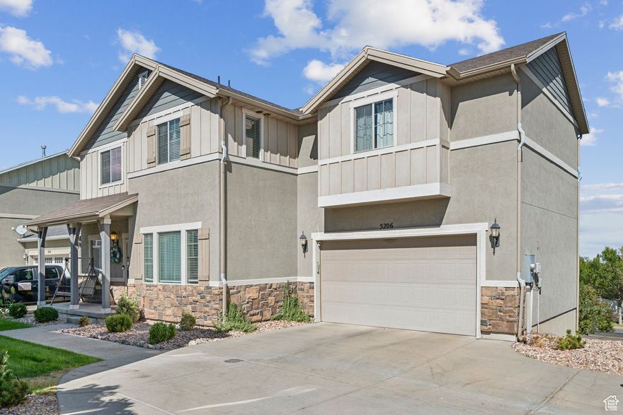 This Herriman charm is one of the community's more desirable properties, offering stunning valley views. You'll be welcomed by an inviting and brightly lit, functional floor plan that's been tastefully updated with a new primary bathroom, updated basement with full kitchen, new paint, carpet, granite countertops, new appliances, and cabinetry. Every one of the five bedrooms features a walk-in closet. Situated in a darling amenity-rich neighborhood. The value of the HOA is in its driveway snow removal, a swimming pool, gym, full landscape maintenance, trash, water, coverage for the exterior (structural, roof, deck, stucco, etc.), biking & hiking trails, park & playground. The walk-out basement has been converted into a mother-in-law apartment offering a functional space with a bedroom, bathroom, dining, and family room. The current owners also obtained fencing approval by the HOA. The home has a water softener, reverse osmosis, and ample garage storage shelving. Square footage figures are provided as a courtesy estimate and obtained from county records. The buyer is advised to obtain an independent measurement.