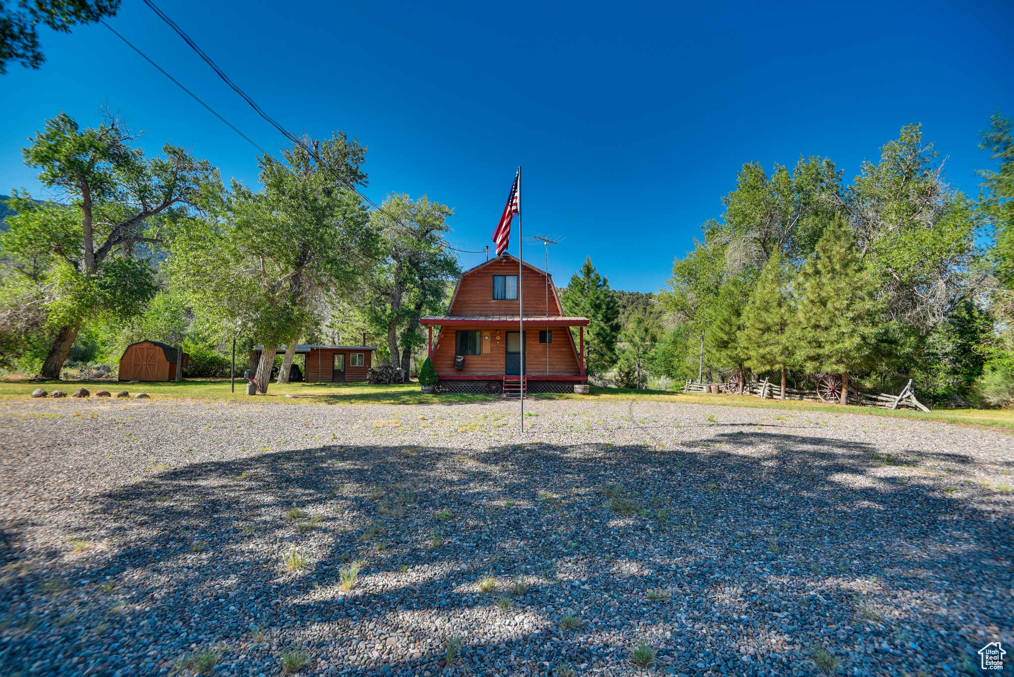 Welcome to your secluded retreat in the woods! This charming two-story cabin offers 2 bedrooms and 1 1/2 bathrooms, perfect for a cozy getaway or year-round living. The property sits on a spacious 4.43 acres, providing plenty of privacy and room to roam. As you approach the cabin, you'll notice a convenient carport for parking. Step inside to find a warm and inviting interior, with a rustic feel that complements the natural surroundings. The main level features a living room, kitchen, and dining area, bedroom and full bathroom, while upstairs you'll find a half bath, large bedroom, and loft that provide ample sleeping space perfect for accommodating extra guests. But the real highlight of this property is the outdoor space. Step out onto the covered porch and take in the peaceful sounds of the stream flowing nearby. Or head to the covered back deck, where you can relax and unwind while overlooking the picturesque stream below. Adjacent 1 acre parcel can be added to cabin acreage for $169,000.