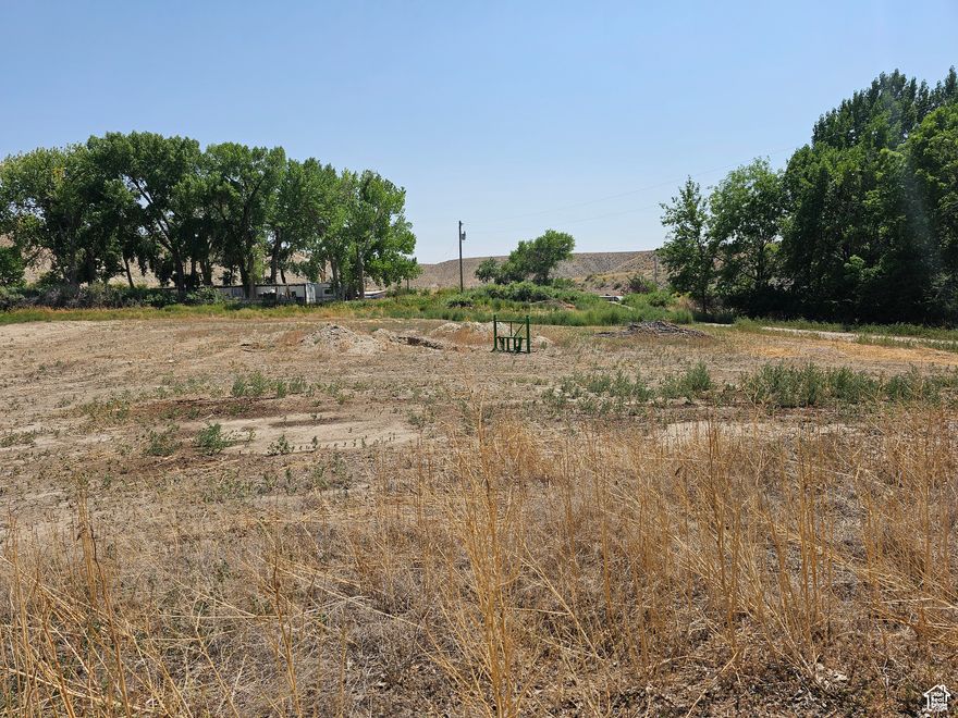 Bridgeland!  A beautiful building site in a high demand, low supply area!  Flat and buildable!  Culinary water, power, and septic system available at buyer's expense.  East of Duchesne in farm country!  Great neighbors!  Easy year 'round, access! Paved County maintained road is a school bus route.  From Hwy 40, turn south on 9250 West.  In approximately 1 mile, the road curves to the west.  The property is on the south side of the curve.