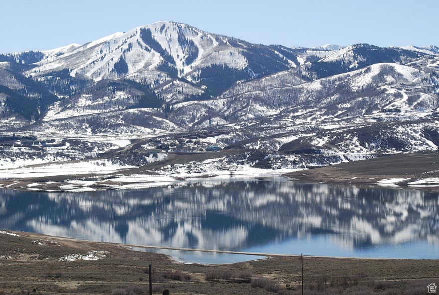 Relish in the breathtaking beauty of the Jordanelle lake and Deer Valley Ski Resort mountain views from the dream home you have always wanted to design for this stunning lot in Hideout, Utah. Wake up every day and look out across the Jordanelle Lake to the slopes of Deer Valley Ski Resort & check out the weather for ski conditions or flat water for a smooth wake board adventure. Only a 10 minute drive to Park City, and you're just a few minutes to the Jordanelle State Park in the Summer and Deer Valleys Deer Crest Gondola in the winter. Close to the New Mayflower Resort Area for year-round enjoyment. Beautiful sunny lot in a great neighborhood where you can build your primary residence or vacation home. This secluded gated community is perfectly positioned between all that Park City has to offer to the west, and horse farms to the east. This Reflection Ridge homesite allows for a home to be built between 3500 to 5500 square feet. An active Design Review Committee ensures your neighbors will build delightful homes as well. READY TO BUILD! Geo Report and Topography Report are available. Buyer required to pay a 1.25% transfer fee to the HOA upon closing and a $100 HOA set up fee. Buyer to pay an annual $3379.43 utility bond through 2036. This amount is included in the yearly property taxes posted on the MLS.