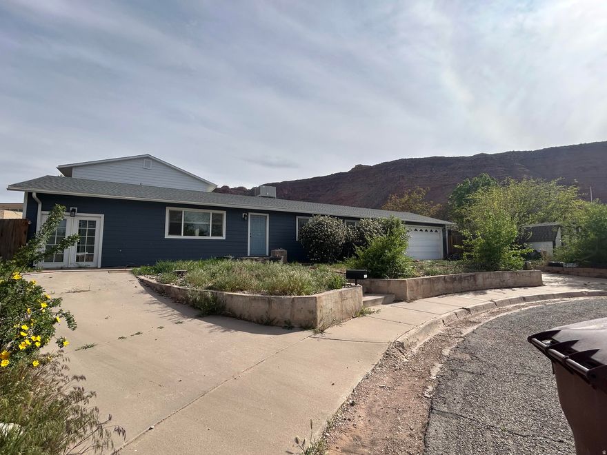 Tucked away at the end of a quiet cul-de-sac, this property has a lot to offer including location, space and value.   Major updates have already been taken care of - including a new roof, Hardie Board siding, soffit, fascia and rain gutters.   Inside you'll find 3 bedrooms and 2 full bathrooms along with a cozy loft area; ideal for a home office, reading nook or creative studio.  A bonus room with tis own private entrance offers potential for a home based business, guest suite or additional living area.  This property also features a spacious 2 car garage, ample extra parking - including RV parking - and a fully fenced backyard.  Schedule a showing today!