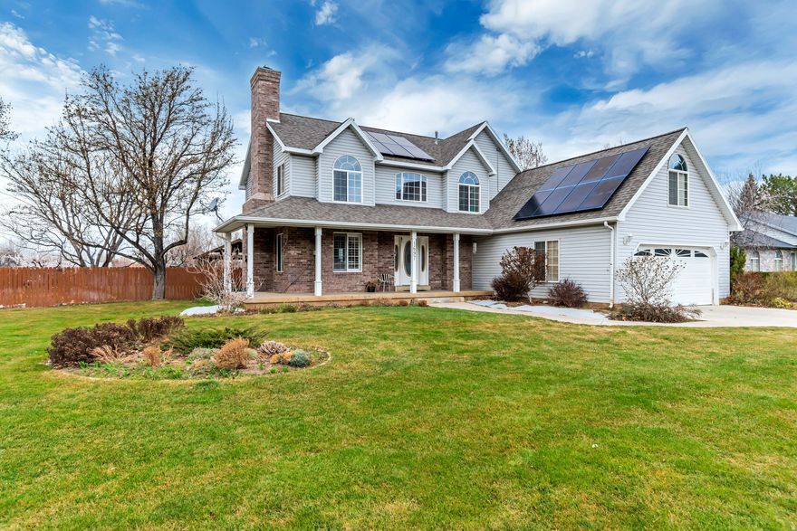 Better than new, this pristine two-story home is located in a highly sought-after Mapleton neighborhood and truly has it all. Extensively updated and upgraded over the past few years, the home features a fully renovated kitchen with custom cabinetry, granite countertops, stainless steel appliances, recessed lighting, and high-quality LVP flooring. All bathrooms have been tastefully remodeled, and the entire plumbing system-not just fixtures-was replaced in 2026. Additional upgrades include two new water heaters, dual furnaces for enhanced efficiency, two A/C units, and a roof replaced within the last five years. The property also includes solar panels with a backup battery (fully paid off at closing), keeping the average monthly electric bill around $15.  Storage is abundant throughout, with walk-in closets, a spacious garage, and a basement that includes a large cold storage room. The basement also features a full kitchen, offering excellent potential for a mother-in-law apartment. Interior highlights include three-tone paint, crown molding, high-end carpeting, a gas fireplace, and plantation shutters.  Situated on a beautifully landscaped half-acre lot, the home boasts stunning mountain and valley views. The yard is fully fenced and equipped with automatic sprinklers, along with mature fruit trees including multiple varieties of apples, pears, cherries, plum, nectarine, apricot, Asian pear, peach, and pluot, as well as grapes, blackberries, and strawberries. Outdoor features also include a large custom storage shed, multiple concrete patios, and ample parking space for vehicles and recreational toys.  Meticulously maintained and completely move-in ready, this exceptional property is a must-see-schedule your private tour before it's gone!