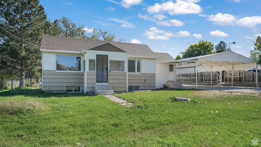 $5,000 Price Drop on this Beautifully Remodeled Home on a Quiet Road in Grantsville! This charming residence sits on a spacious corner lot with mountain views and a fully fenced backyard-perfect for entertaining or relaxing. Enjoy a deck, mature trees, and room for a vegetable garden, along with a large 2-car carport. Inside, the home offers 2 bedrooms and 2 baths upstairs, plus 1 bedroom and a large family room in the fully finished basement. The kitchen has been completely upgraded with quartz countertops, new cabinets, and stainless-steel appliances (range, dishwasher, microwave). Additional updates include a new roof, new exterior paint, new carpet, new luxury vinyl plank flooring, designer two-tone paint, and updated light fixtures. This home is truly move-in ready and conveniently located near all local amenities. Vacant and easy to show! Supra on the front door. Schedule appointments through Aligned Showings. Please allow 48 hours for corporate seller response. All measurements are from county records and provided as a courtesy; buyer and buyer's agent to verify. No seller disclosures-seller has not occupied the property.
