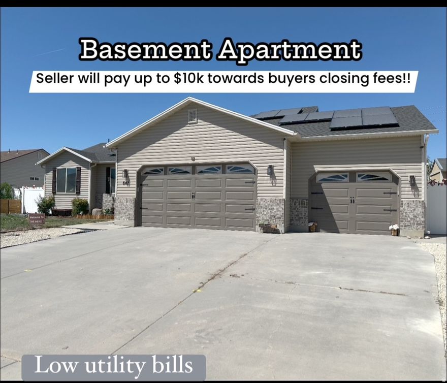 Seller will pay up to $10,000 towards closing fees. Welcome to this updated rambler with Beautiful mountain views that offers both function and flexibility in a prime Tooele location! The main level features a stylish open-concept layout that's perfect for everyday living and entertaining. One of the standout features is the spacious 3-car garage-Offering ample space for two vehicles plus toys or a workshop. The downstairs basement with its own private entrance was just converted into a mother-in-law suite or rental unit with the addition of a new kitchen, new kitchen cabinets flooring and lighting plus a new dishwasher to convey. Enjoy lower Utility bills with Recently installed solar panels that have been paid off - all of this with the convenience of being just minutes from shopping, dining, and Tooele's commercial center-while still being close to outdoor recreation and mountain adventures and blocks from A new beautiful park with walking paths and playgrounds. Whether you're looking for multi-generational living, income potential, or simply more space, this home delivers. Don't miss out-schedule your private showing today! oh and there is no HOA!
