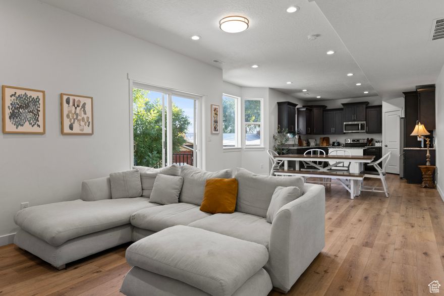 **NEW PRICE, DON'T MISS OUT!** Welcome to this beautiful home tucked away in a quiet Harrisville cul-de-sac. Sitting on a generous .33-acre lot, this property offers the space and flexibility today's buyers are looking for. Enjoy a large driveway in addition to a two-car garage, giving you plenty of parking for family and guests. For those with extra vehicles or toys, the property also features a dedicated RV spot in the backyard, a rare find in the area. The backyard and lot provide endless possibilities for entertaining, gardening, or creating your dream outdoor space. With its prime location in a peaceful neighborhood, this home strikes the perfect balance of comfort, convenience, and functionality. Whether you're looking for more room to grow, extra space for your hobbies, or simply a quiet retreat to call home, this Harrisville gem has it all.