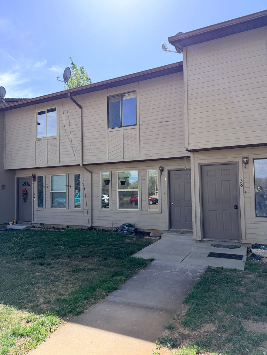 Great place for someone looking to downsize or just getting started on their own! 2 bedrooms, 1.5 bathrooms with living/dining and kitchen on the main floor. Fresh new paint throughout. Great small outdoor area off the kitchen and dining room.   Square footage figures are provided as a courtesy estimate only. Buyer is advised to obtain an independent measurement.