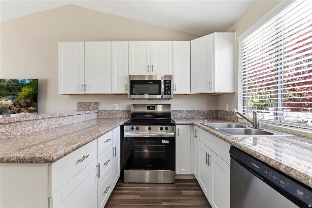 Photo of 6085 S PARK WOOD DR W, Kearns, UT 84118 (MLS # 2148867)