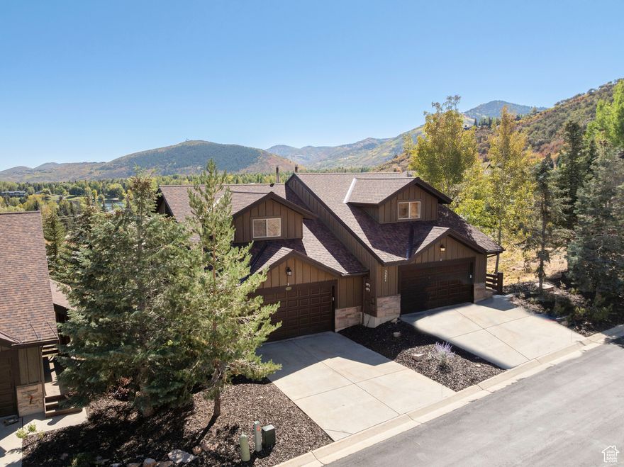 Welcome to 5221B Cove Canyon Drive, a beautifully appointed 4-bedroom residence tucked into one of Park City's most desirable mountain settings. This spacious home combines  classic alpine charm with modern comfort, offering the perfect retreat for year-round living or a seasonal getaway. Inside, you'll find an open and inviting floor plan with generous living  spaces, high ceilings, and large windows that frame the surrounding natural beauty. A warm fireplace anchors the great room, creating a cozy gathering spot after a day on the slopes  or exploring the nearby trails. The kitchen and dining areas are ideal for entertaining, while the four spacious bedrooms and three bathrooms provide comfort and privacy for family and  guests. Step outside to enjoy peaceful mountain views and the quiet privacy of Cove Canyon, all while being just minutes from Park City's world-class skiing, shopping, dining, and entertainment. With a private 2-car garage, thoughtful finishes, and a location that blends serenity with convenience, this home represents a rare opportunity to own a true Park City retreat.