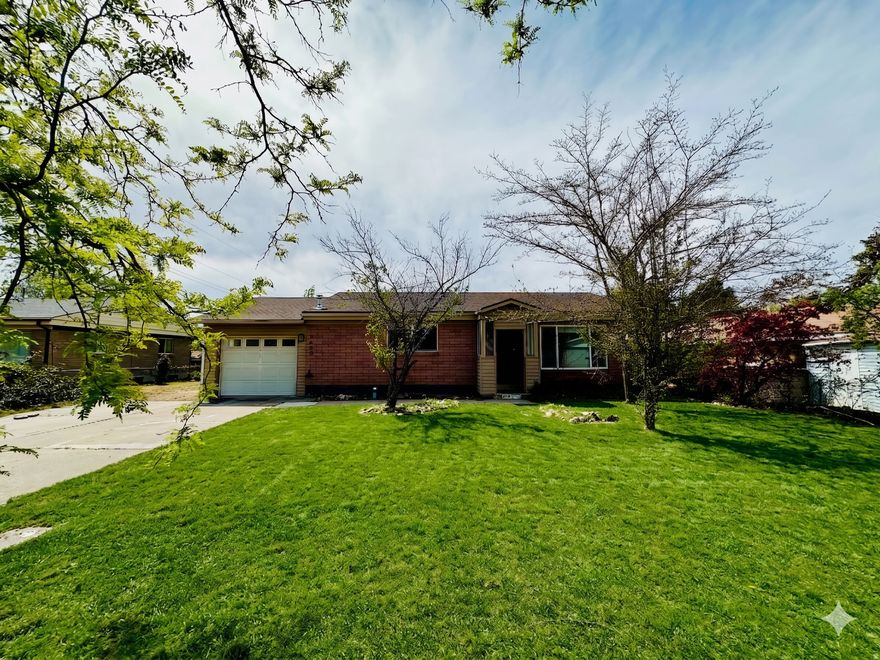 *** OPEN HOUSE THURSDAY APRIL 23 FROM 4-6PM AND SATURDAY APRIL 25 FROM 10AM-12PM and 1PM- 3PM**** Handyman special with great bones-just needs a little TLC. This Midvale home sits on a rare, oversized lot in a location that's hard to beat. Tucked into a quiet, established neighborhood, you'll enjoy quick access to I-15, shopping, and restaurants-while still getting that neighborhood feel you are after.  The large lot is the real standout here-offering space you just don't see often at this price point. Whether you're thinking future expansion, adding a garage , ADU or a large shop, creating your dream backyard, or simply enjoying room to spread out, this property gives you options. There is even enough space on the side of the garage to park RV's!  Inside, the home offers a functional layout with comfortable living spaces, great natural light, and newer vinyl windows for energy efficiency. The kitchen flows into the main living area, making it easy for everyday living and entertaining. The master bedroom has a private 1/2 bath. Dont Miss the BRAND NEW ROOF installed last month!!   This is a great fit for a first-time buyer, someone looking for more space, or an investor wanting a property with long-term upside.  Opportunities like this-a solid home on a great lot in a central location-don't come around often. Vacant and easy to show. *Some photos have been virtually staged or enhanced*