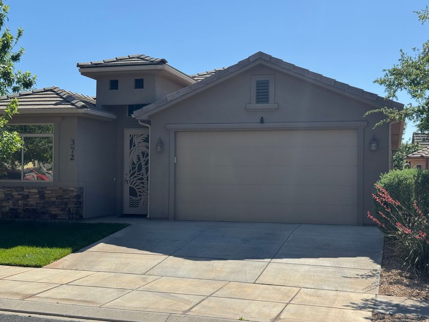 Newer 2 bedroom home near Hurricane Elementary with office/den that could be converted to third bedroom. No HOA. Two car garage. Upgrades including newer carpet, granite countertops in kitchen, water softener and 8' interior doors. Easy to show. Contractor box on front door - call or text agent for code.