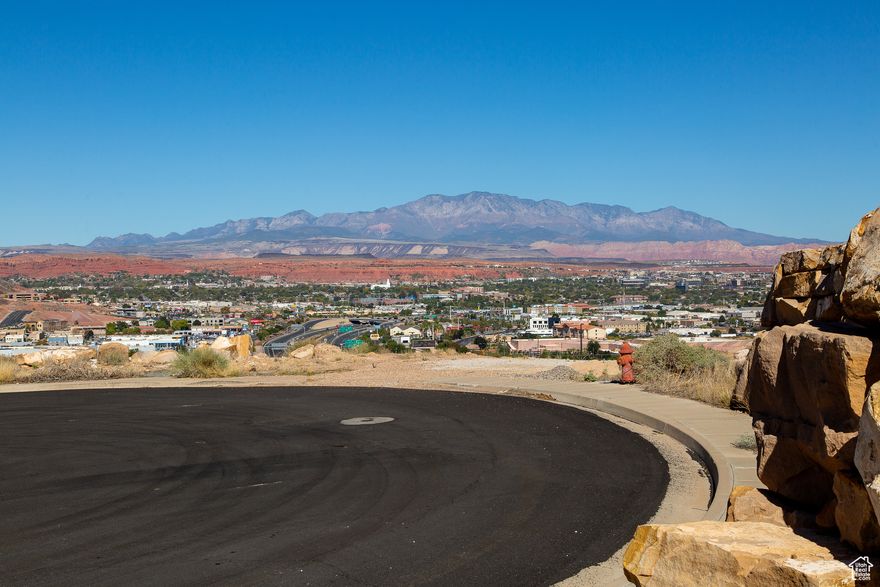 Tens of thousands of dollars spent to prep this incredibly sumptuous Lot overlooking the vast valley of St. George, northward to Pine Valley and eastward to Zion. Non-duplicable. Large size to accommodate your floor plan and lifestyle needs. YOU choose your own builder too. NO HOA fees. CC&R's provide direction on what you can build to have a consistent neighborhood with a variety of home elevations. A prime "location, location, location" within minutes to downtown St. George, I-15, Southgate golf course, big box stores and all things quickly reached.