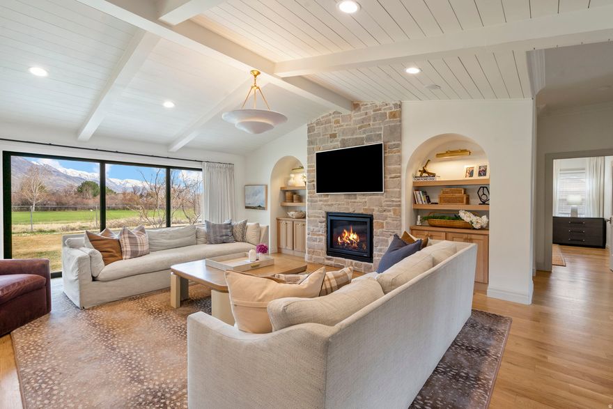 **New Price-best value and the best view in the area. Home Appraised for $1.6m, priced to sell** Stunning Golf Course Rambler with Luxury Upgrades in the Heart of Highland . Nestled in one of Highland's most desirable neighborhoods, this beautifully updated 4,266 sq ft rambler sits on a spacious 0.31-acre lot and offers the perfect blend of comfort, functionality, and luxury. Thoughtfully renovated with major system upgrades including new electrical, plumbing, and HVAC, this home provides peace of mind along with timeless style. Step inside to discover raised ceilings, real hardwood white oak floors and expansive rear-view windows that fill the home with natural light and showcase the serene backyard setting with a large 12 foot slider. The chef's kitchen is designed for entertaining and features premium Monogram gas/electric wifi enabled appliances, a warming drawer, pebble ice maker, and beverage cooler, creating the ultimate space for hosting family and friends. The luxury primary suite is a true retreat, complete with a spa-like bathroom featuring heated tile floors and a conveniently located laundry in the primary closet. A second laundry area downstairs adds everyday convenience. Outside, the home continues to impress with a new smart sprinkler system and new sprinklers throughout, gas BBQ line, and an in-ground trampoline, perfect for entertaining or relaxing in the beautifully landscaped yard. The three-car garage includes new doors, cameras, a gas heater hookup with direct flume, and 220V power, while generator-ready wiring ensures added preparedness. Additional highlights include a custom whole-home speaker system complete with bluetooth, design plans for a future patio/outdoor living space, and a layout ideal for both entertaining and everyday living. With thoughtful upgrades, luxury finishes, and an unbeatable Highland location, this home offers the rare opportunity to enjoy modern comfort in a mature, established neighborhood.