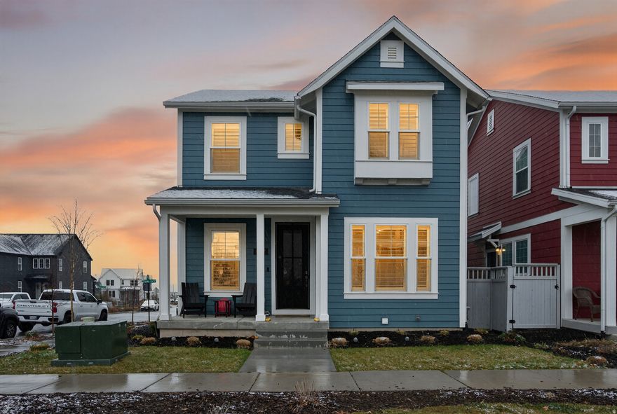 Positioned on a charming courtyard corner, this pristine home is flooded with natural light through large windows throughout. The heart of the home is the Great Room, where a modern working kitchen and dining area flow seamlessly into the family space-an ideal open layout for entertaining. Enjoy a fully finished basement, plantation shutters, whole-home water filtration, and an extended garage for gear storage. Located just steps from Oquirrh Lake, trails, and community pools, this move-in-ready gem offers the complete Daybreak lifestyle without the new-construction wait.
