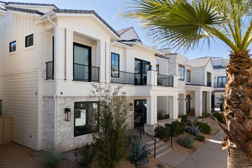 Stunning luxury vacation home in Desert Color Resort offering the ultimate St. George getaway and investment opportunity. This expansive 8 -bedroom, 7 full + 2 half bath property comfortably sleeps up to 32 guests and is designed for both high-end living and unforgettable group experiences. Located just steps away from the 2.5-acre lagoon with sandy beaches, this home delivers true resort-style living in one of Southern Utah's most sought-after communities. Inside, you'll find a thoughtfully designed layout across three levels featuring a private home theater, spacious gathering areas, and a fully equipped kitchen ideal for entertaining. The home is loaded with amenities including arcade games, ping pong, shuffleboard, and multiple indoor/outdoor living spaces that make it perfect for hosting large groups or maximizing nightly rental potential. Step outside to your own private oasis with a pool, hot tub, covered patio, BBQ area, and a third-level rooftop deck complete with fire table and ample seating--perfect for enjoying Southern Utah sunsets. Desert Color Resort offers unmatched amenities including a lagoon for swimming, paddle-boarding, and kayaking, resort-style pools and hot tubs (heated year-round), pickleball courts, and a vibrant community atmosphere with ongoing events such as food truck nights, live entertainment, and family activities. Additional features include a 2-car garage, ample nearby parking, and access to boat/RV/trailer parking within the community. Whether you're looking for a luxury second home, a high-performing nightly rental, or a property that offers both lifestyle and income, this home checks every box. Buyer to verify all information.