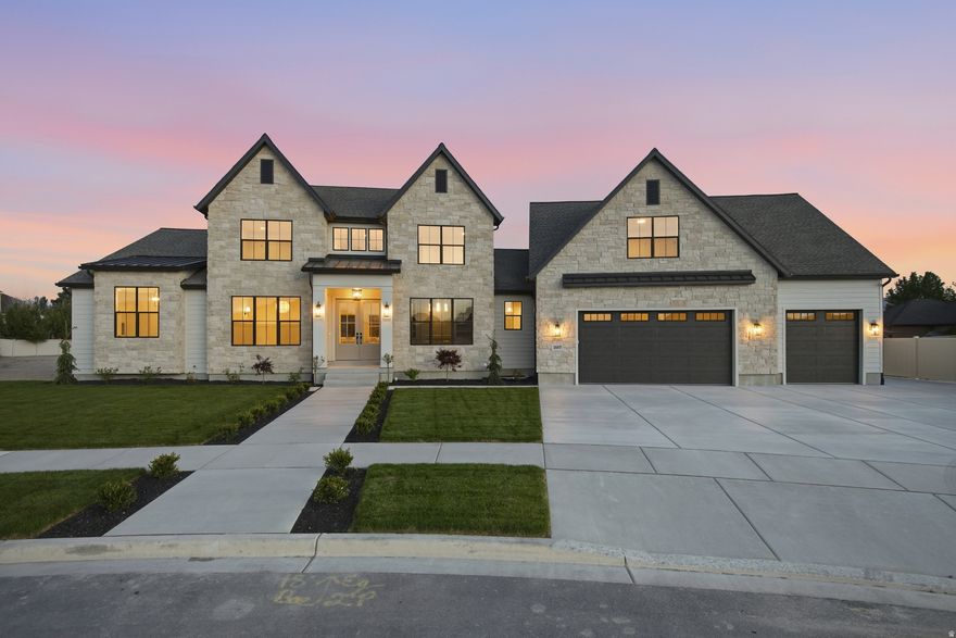 **OPEN HOUSE SATURDAY, MAY 2nd @ 11:00-1:00pm** Stunning New Lehi Home w/ADU and Mother-In-Law Apt. The Beautiful Front Door welcomes you into the Entry including a Den and Formal Living room to each side. Continue into the Elegant Great Room with a Beautiful Stone Fireplace Focal Point, LVP Flooring, and Gorgeous Gourmet Kitchen which includes a very large Island w/Quartz Countertops and Farm sink. Top of the Line Appliances include: Large Gas Range with 2 Ovens, Range Hood, Commercial Size Refrigerator and 2 Dishwashers. Full Butler Pantry includes a Butler Area w/outlets and Cabinets for Appliances, a Sink and Space for a Refrigerator and Lots of Shelves. The Mudroom has many Lockers & Cabinets and don't miss the Homework Station and Large Laundry room!  The Primary Bedroom is on the Main with a Large Bathroom including a Free-Standing Tub, Oversized Shower, Double Sinks and Large Walk-in Closet complete with its own Washer/Dryer Hookups! Walkout to the Covered Deck from the Primary and Great Room and enjoy the Gas Hookup for Outdoor cooking, Deck Fan, Flood Lights, and the Speaker System which is also run throughout the home!  The Finished Basement has a Mother-in-Law Apartment including a Full Kitchen, Laundry, 1/2 Bath, and 2 Bedrooms each with their own Private Bathroom. Downstairs also includes a Home Gym, Theater Room, and Great Storage. Other amenities include - 2 Tankless Water heaters for the main house, 1 Tank Water Heater for the ADU,  4 Furnaces and 4 A/C units for the entire home, Water Softener Loop, WiFi Extender Wiring through all floors, Security Camera Wiring run, 4 Car Garage with Epoxy Floors, and EV Charging. Outside offers RV and Extra Parking with a Large Backyard Space for Potential, Pool, Courts, and Detached Shop.  *The 2 Bedroom/1 Bath ADU is above the garage with a separate entrance.  You'll see the stats separated out in the 3rd floor remarks.