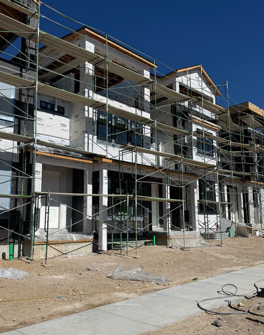 Welcome to The Vistas at Lehi, a luxury townhome community located in the heart of the Traverse Mountain area. Enjoy easy access to world-class skiing, modern conveniences, and all the outdoor recreation Utah has to offer. This home features an unfinished basement, providing room to grow, along with a spacious open-concept layout that seamlessly connects the living, dining, and great room areas-perfect for both everyday living and entertaining. Upstairs, you'll find three bedrooms plus a bonus level with a loft space that can easily function as a flex area or home office. Enjoy a covered rooftop deck with stunning views of Utah Valley. Currently under construction with an estimated completion in Summer 2026. Ask about available incentives, including interest rate options, to help make this beautiful new home yours!