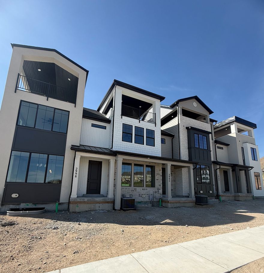Be the first to live in this luxury townhome! Welcome toThe Vistas at Lehi, a luxury townhome community in the heart of the Traverse Mountain area. Enjoy convenient access to world-class skiing, outdoor recreation, shopping, dining, and major commuter routes. This home features a spacious open-concept layoutthat seamlessly connects the living, dining, and great room areas-ideal for both everyday living and entertaining. Theunfinished basementprovides room to grow and future expansion potential. Upstairs, you'll find three bedrooms, along with an additionalbonus level featuring a loft space-perfect for a flex area, second living space, or home office. Enjoy a covered rooftop deckwith stunning views of Utah Valley. Estimated completion: June 2026. Ask about available incentives, including interest rate options, to help make this beautiful new home yours!