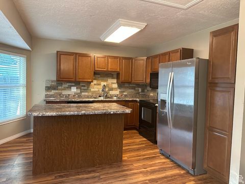 Tiny photo for 6092 S LONGMORE DR W, Salt Lake City, UT 84118 (MLS # 2136017)