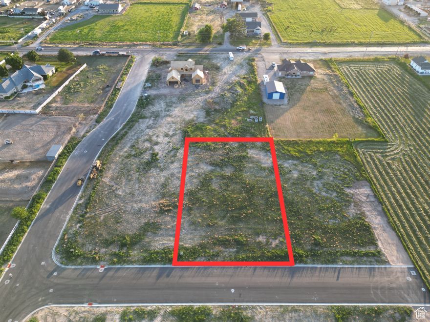 This lot offers you the opportunity to build your dream home and hobby farm in a developed community in West Weber County. If you enjoy wide open spaces, beautiful summer sunsets and the feel of the country this is the location for you. This is a rare opportunity for you to bring your own builder, be your own builder or we can refer you to a builder. Stubbed for culinary, secondary, sewer, gas and power. Ready for a building permit to be pulled. This lot is just over a half acre at .54 or 23,498 sqft. It's just over 119' wide and just over 196' deep. The setbacks are 30' in the front, 10' on the sides with 24' for both sides. Buyer agent and buyer to verify all information.
