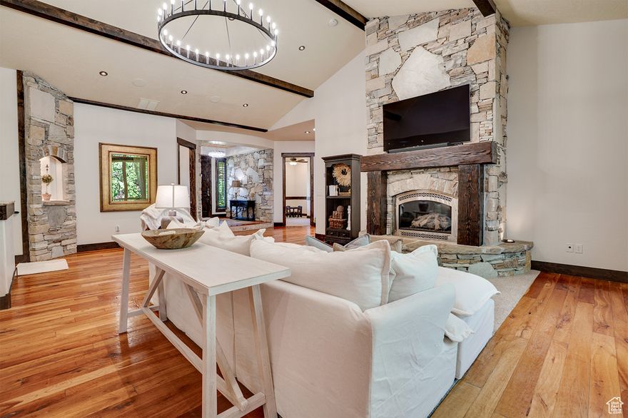 Welcome to this beautifully updated mountain home in Midway's coveted Dutch Fields community. Built with the best of the best materials: wood doors, floor, trim and shutters. High quality wood cabinets and beautiful granite countertops. Light-filled and move-in ready, this residence features fresh interior and exterior paint, updated lighting, and newer mechanicals-including furnaces, A/C unit, and water heaters. The open-concept great room offers the perfect space for entertaining, while the main level also includes a luxurious owner's suite, a private home office, and an additional bedroom. Downstairs, enjoy a spacious second living area with a home theater and included pool table, three additional bedrooms, an oversized laundry room with extensive storage, and a dedicated storage room. Step outside to your own private wellness retreat featuring a cold/hot plunge, sauna, and in-ground trampoline-all thoughtfully included. Mature, manicured landscaping surrounds the home, offering privacy and natural beauty year-round. Additional highlights include an EV-ready four-car garage, solar panels, and custom upgrades throughout. All this in Midway's premiere neighborhood. Dutch Fields amenities include two swimming pools and playgrounds, tennis court, ponds, clubhouse, and multiple walking paths.  Square footage figures are provided as a courtesy estimate only. Buyer is advised to obtain an independent measurement and verify all listing details.