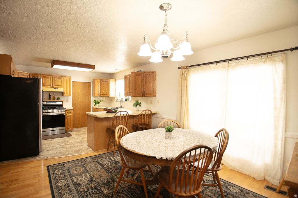 Photo of 210 E 2100 S, Providence, UT 84332 (MLS # 2139108)