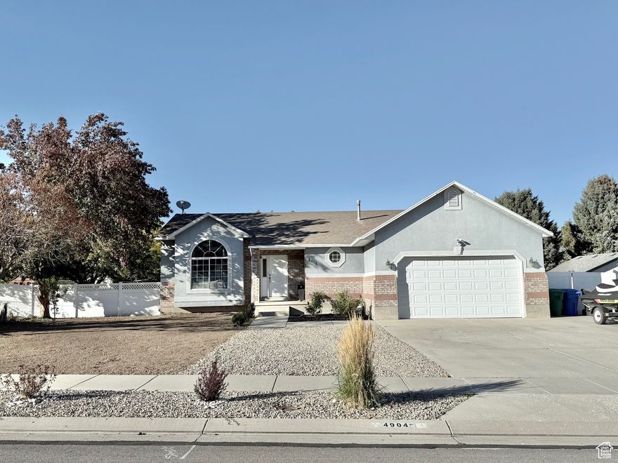 100% finished rambler in great West Jordan neighborhood*Remodeled with light bright open layout*2 Updated Kitchens*Granite slab counters*Stainless appliances*2 laundry rooms*Fireplace*Grand primary suite with separate shower, jetted tub and dual sinks*Updated lighting*Extensive laminate floors*Walk out basement with two entrances one through garage and one on the exterior*EV charger in garage*Landscaping ready for zero scape or sod.