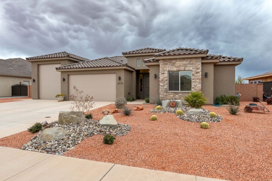 Seller will carry 4.75% rate for 3 years with 20% down. Welcome to this beautiful home in Sedero at Desert Sands. Offering comfort, style, and thoughtful upgrades throughout. The open and inviting floor plan features upgraded carpet, luxury vinyl flooring, and abundant natural light, while the modern kitchen offers painted cabinets and quartz counter tops. The primary suite includes a spacious custom walk-in closet, dual sinks and a walk-in shower. There is a convenient half bath, blinds on all windows and an attached 42 feet deep RV parking garage. Step outside to enjoy the covered patio, fully landscaped and fenced yards, complete with drip irrigation, automatic sprinklers, and a lush lawn. Conveniently located near parks, shopping, and Southern Utah recreation, this property is a wonderful opportunity to enjoy quality living in a desirable neighborhood.