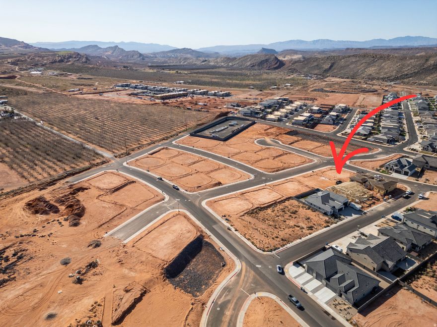 Subdivided lot in a new section of Sand Hollow Village subdivision. Bring your builder and build the home of your dreams!