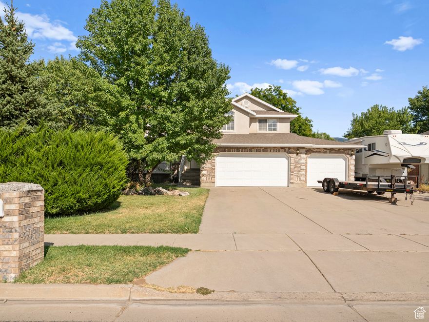 Welcome to South Weber living. Nearly 3,000 square feet with a smart, spacious floor plan and quality updates throughout. The updated kitchen and dining area shine, while large bedrooms and cozy living spaces make it easy to feel at home. Outside, enjoy a beautifully kept yard, an extra-deep three-car garage, and RV parking. Well cared for and move-in ready!  Square footage figures are provided as a courtesy estimate only and were obtained from Tax Data .  Buyer is advised to obtain an independent measurement.