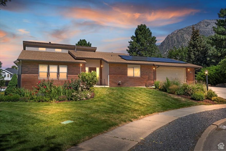 Large spacious home on .28-acre cul-de-sac lot.  This home has a master bedroom upstairs and one downstairs.  This home has updated windows and solar panels.  Large storage area under the garage.  Home backs up to one of 9 parks in the development.