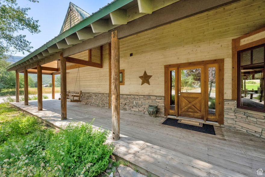 Experience the best of country living and investment opportunity with this stunning Liberty property set on a total of 9.7 acres. The property comprises three parcels: the main home, a 0.49-acre lot (Parcel #22-120-023), and a 6.39-acre parcel (Parcel #22-012-0001) with AV-3 zoning, which has the potential to be developed into two additional lots. The 3,643 sq ft home features four bedrooms, two flex spaces, and a large upstairs family room with incredible mountain and valley views.  A 2,450 sq ft shop with CV-2 zoning offers potential for both business and hobby use. The property also includes 32 shares of Liberty Irrigation water and one share of Liberty Pipeline culinary water. Enjoy peaceful country living with room to grow and invest.