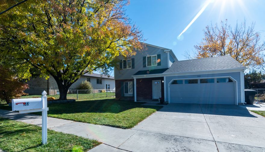 Beautiful 3-bedroom, 2-bath home with a 2- car garage and plenty of parking in the heart of Payson! Bright, open layout with a spacious main-level flex room-perfect as an extra bedroom, home office, den, or family room. Features custom cabinetry throughout and the upstairs bedrooms offer privacy and comfort. Enjoy a large fenced yard ideal for relaxing, gardening, or entertaining. The backyard includes an apple and plum tree, grapes on the fence, and a basketball hoop! The roof is only 1 year old and has a fully transferrable warranty to the next owner. Conveniently located near schools, parks, and downtown Payson with quick access to shopping, dining, and I-15. Move-in ready with room to personalize and make it your own in a quiet, established neighborhood! Square footage figures are provided as a courtesy estimate. Although information deemed reliable, buyer and buyer agent to verify all information.