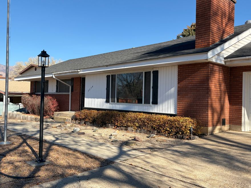 Spacious Brick Rambler on the Ogden East Bench. This beautifully remodeled 5-bedroom, 2 bathroom on a Dead end road, Offers over 3300 Sq. Ft. of comfort and convenience, and within walking distance of Weber State University and preparatory schools.  Enjoy stunning views of Malan's Peak/Wasatch Front from the comfort of your Dining/Sun room. Located just minutes from downtown Ogden, and Ogden Canyon offering World class skiing, hiking, and Mtn biking, making it a dream for outdoor enthusiasts as well as nature lovers. The kitchen offers granite countertops with brand new stainless steel appliances. The basement with its own kitchen and spacious family room, has great potential for extra income. The low- maintenance xeriscape front yard adds charm to this well built East facing home and at the same time is H2O conservative. Square footage is estimated from county records, buyer and buyer's agent to verify all, all information provided as a courtesy.