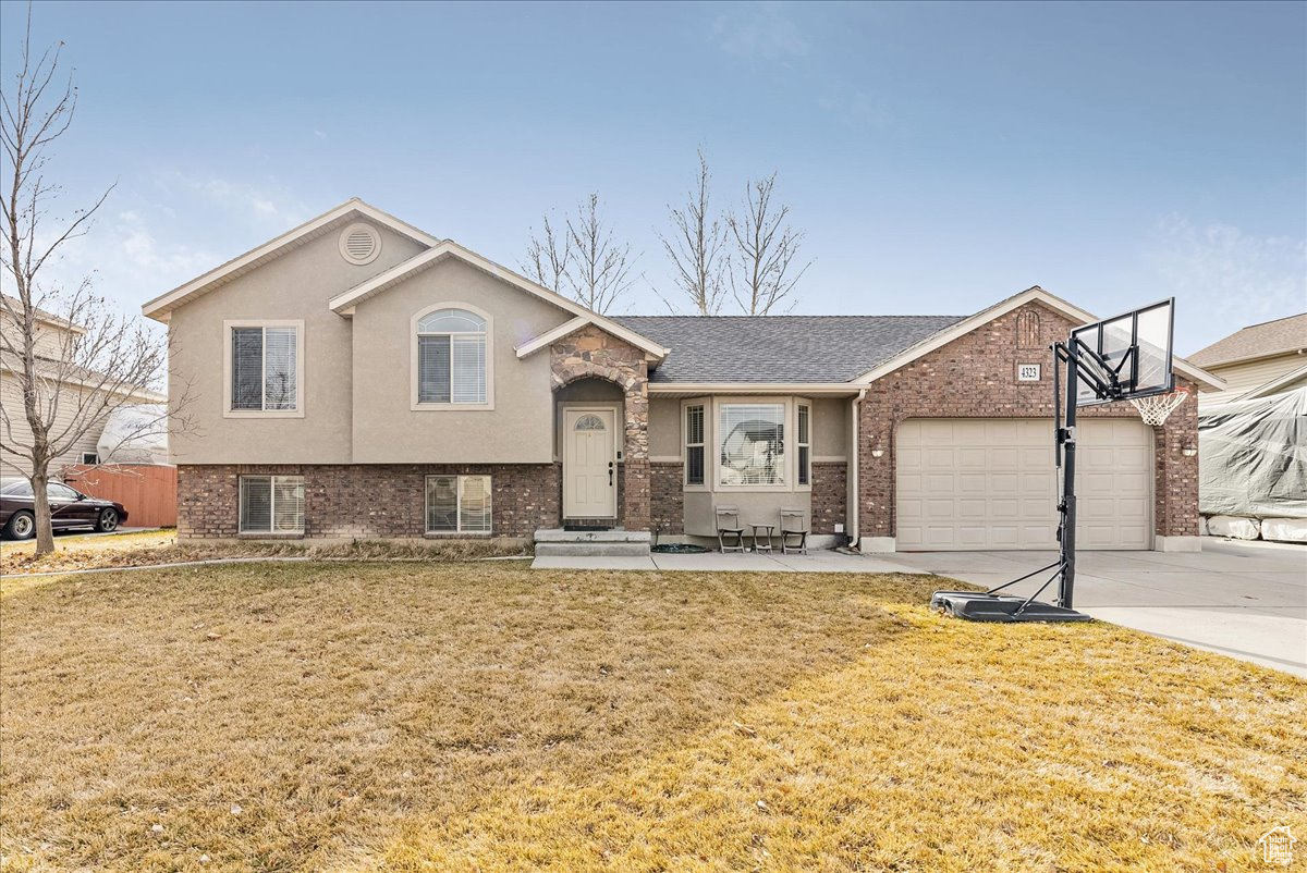 Welcome to 4323 W 25 S, West Point, Utah 84015-a spacious 4-bedroom, 2.5-bathroom home offering 2,080 square feet of comfortable living space. Situated on a generous 0.36-acre lot, the property boasts a two-car garage, and ample parking including RV parking. Enjoy stunning mountain views and the privacy of having no neighbors behind.    Square footage figures are provided as a courtesy estimate only and were obtained from county records.  Buyer is advised to obtain an independent measurement.