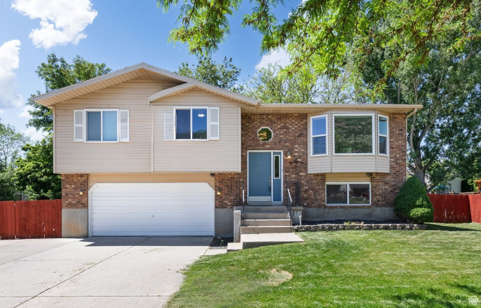 Affordable Farmington gem just minutes from Station Park shopping, Frontrunner, top-rated schools, and miles of hiking trails! Inside you'll find rich hickory-stained hardwoods, granite countertops, and an inviting open layout perfect for gatherings. Step outside to a spacious covered deck overlooking a private yard-ideal for summer BBQs. Major updates done: roof and energy-efficient windows (2010). Move-in ready comfort in a prime location-schedule your tour today! Agent please read agent remarks.