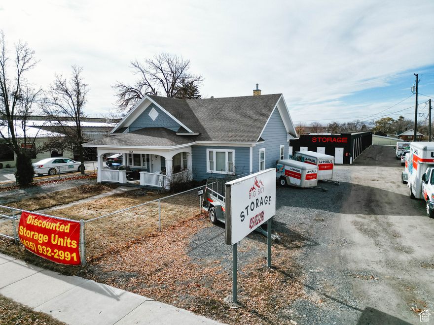 Triple the Income, Triple the Opportunity! This Smithfield Main Street gem isn't just a property-it's a built-in business plan with 3 revenue streams all under one roof (well, technically a few roofs)!   41 Storage Units  Always in demand, always cash flowing.  U-Haul Franchise  Turnkey traffic-driving business with customers coming to you.  Rental Home  Extra passive income or a cozy place to have a manager live while managing your investment.  Whether you're after a 1031 exchange or just want a property that practically pays for itself, this one checks all the boxes. The charming 1909 home brings history, while the storage units add modern income power.   Don't wait-opportunities like this don't stick around. Call today to learn more or schedule a tour!