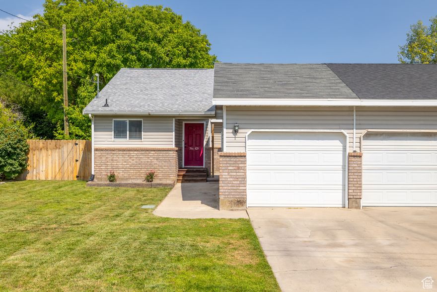 **NO SHOWINGS PRIOR TO UC-ALL OFFERS MUST BE SUBJECT TO A PHYSICAL INSPECTION IF YOU WISH TO SEE THE PROPERTY-TENANTS IN PLACE PLEASE DO NOT DISTURB* Beautiful updated Twin home with a large yard, vaulted ceilings in the living room-kitchen area, garage parking, and a newer roof (2020).  All this, combined with a great location close to everything make this a great investment! Square footage figures are provided as a courtesy estimate only and were obtained from a previous listing.  Buyer is advised to obtain an independent measurement.