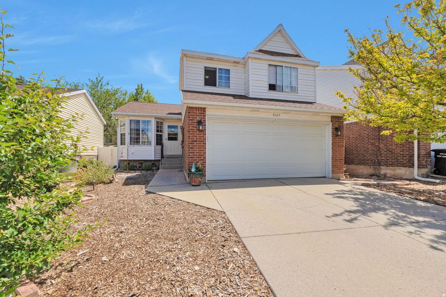 Welcome to this warm and well-loved West Jordan home. Enjoy the convenience of being ideally located in a quiet, established neighborhood, near parks, schools, shopping, and easy freeway access. Love the open feel, vaulted ceilings, and comfortable living spaces. The yard has been a labor of love with favorite plants and flowers, including Iris, Peonies, and Lilac. The peach tree is very giving and yummy!  The front and side yards invite butterflies, bees, birds, and occasional quails, ducks, and squirrels. The yard has been landscaped to be water-wise and easily maintained. Sit on the comfortable back deck and listening to the bird songs. When it gets colder enjoy a nice fire in the fire pit with plenty of room for friends and conversation.  Great neighborhood with very little traffic, especially in this dead end cul-de-sac.  6 year old roof and 5 year old furnace and AC.  Make an appointment and come and see today!