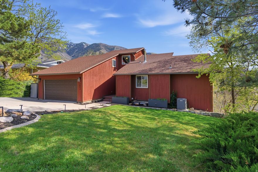 Modern mountain retreat on a private, wooded .40-acre lot with no neighbors on one side, plus direct access to Bell Canyon Gulley trails. Enjoy sweeping Wasatch Mountain and valley views from three expansive decks and two serene and private stream-side patios. Located just 23 minutes door-to-door from Snowbird/Alta with convenient access to Big and Little Cottonwood Canyon resorts. This flexible property can function as a single-family home or offer potential for two separate living units, with proven rental income of up to $6,000 per month from the ADU during ski season. Major system updates include new windows (2023), water heater (2021), and furnace (2025).