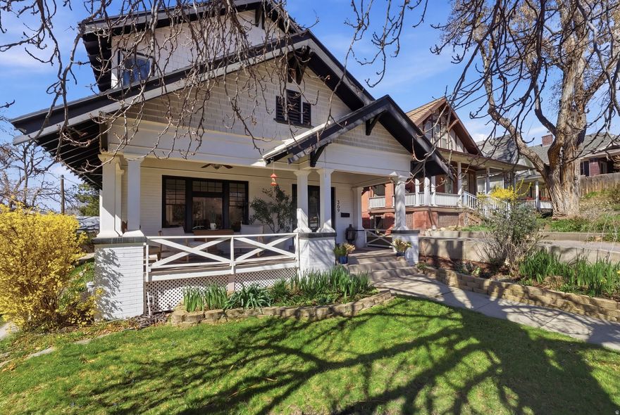 A Rare Offering in The Avenues, where Historic Craftsmanship meets Modern Elegance.  Shows like an art gallery, this 1908 Craftsman Bungalow is a study in light, character, and timeless design. Set along a treelined street in one of Salt Lake City's most beloved neighborhoods, the property welcomes you with a gracious front porch that recalls the charm of a bygone era-an inviting place to pause, connect, and enjoy the rhythm of the community. Inside unfolds with original hardwood floors, period hardware, arched openings, and a vintage tiled fireplace with builtin shelving-each detail curated to honor its heritage. The updated kitchen blends seamlessly into this characterrich backdrop, offering a gas range, stainlesssteel appliances, and generous counter and cabinet space. The main level is designed for effortless living, featuring a laundry room, versatile crafts room or office, den, full bath, and a spacious bedroom. Two large gathering rooms, dual furnaces, and central A/C ensure comfort throughout the seasons. The secondstory addition elevates the experience with an oversized primary suite-sunlit, serene, and framed by panoramic views stretching from downtown Salt Lake City to the Wasatch and Oquirrh mountain ranges. It's a breathtaking vantage point for both sunrise and sunset, offering a daily reminder of the beauty that surrounds. An expansive back deck extends the area outdoors, overlooking a lowmaintenance landscape designed for gathering and relaxation. A firepit and grill create the perfect setting for long summer evenings beneath The Avenues sky. A coveted oversized onecar garage and carport provide ample storage, enhanced by an attic area and elevator lift-offering the potential for an ADU. The basement includes a hidden outside entrance and the opportunity to create a motherinlaw apartment, making the property ideal for multigenerational living or rental income. From this central Avenues setting, enjoy easy access to the University of Utah, bus lines, local coffee shops, Lindsey Gardens, Memory Grove, the airport, and the vibrant energy of downtown Salt Lake City. Buyer to verify all.
