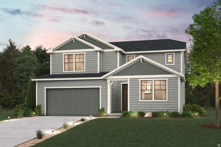 Two-story exterior with gray siding, dark roof, attached garage, and a concrete driveway with ground lighting
