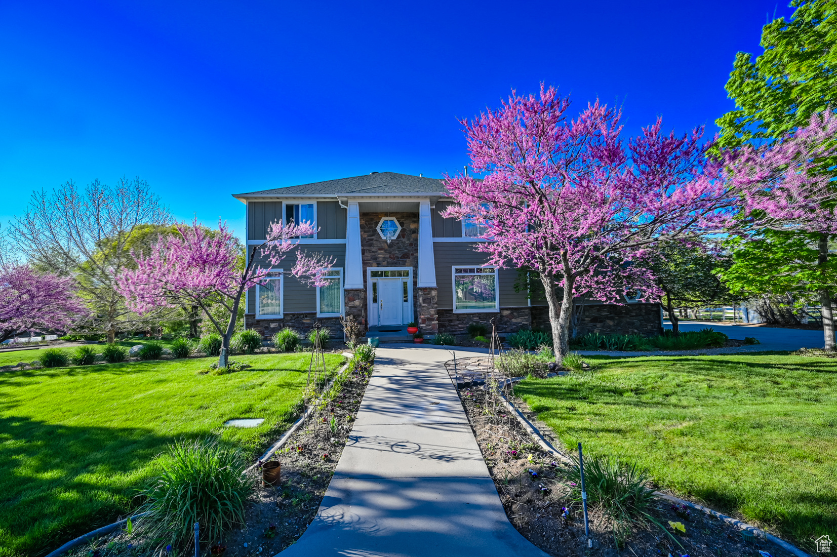 This home is located on 1.04 acres of land in Draper with valley views and mountain views and great for gatherings, parties, and total privacy. Fully finished basement with separate walk out entrance. True primary suite with large bedroom with walk out patio, separate bath and tub, two separate vanities, and walk in closet. Located perfectly between the Draper Canal and Porter Rockwell Paved trails and 3 minutes to the freeway, but far away enough that you don't see or hear it. Tenants are responsible for renters insurance, water, sewer, garbage, electric, gas, and snow removal. If desired, tenants are also responsible for pest control, internet, and cable. **ACTION TEAM REALTY HAS THE RIGHT TO CHANGE LEASE TERM LENGTHS DEPENDING ON THE RENTAL MARKET**