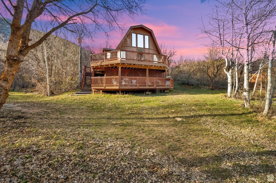 Nestled amidst towering trees and serene landscapes, this cozy retreat is the perfect getaway.  Imaging morning by the crackling fireplace, evenings soaking in valley view, and days exploring the tranquility of the great outdoors. Weather you're seeking a peaceful sanctuary or a place to create cherished memories, this cabin offer the ultimate in warmth, charm and scenic beauty in Oak Haven, Midway Utah.  Note walls for bedrooms were taken out to create open space, had 2 bedrooms up and 1 down at one time.  You would need an additional 8 shares of water to have year round living. Shares can be rented from other owners. Turn key with all furnishing included.