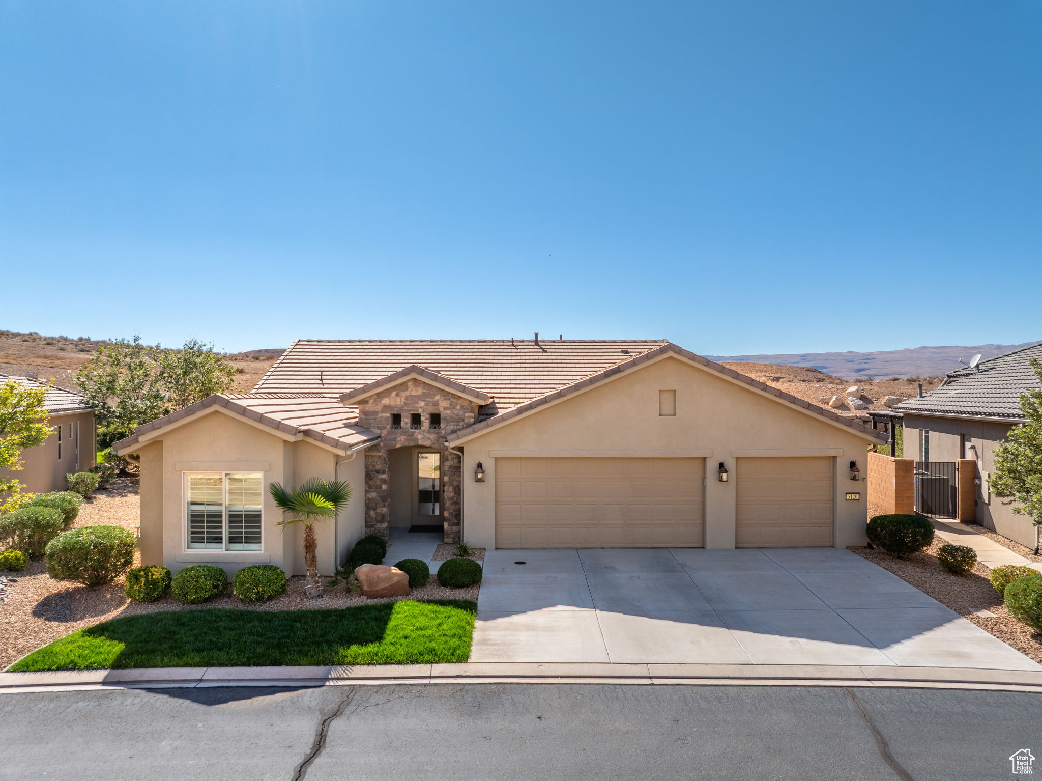 Located on the southern edge of Sun River, this 2-bedroom, 2-bath home with a bonus office combines timeless finishes with modern convenience. A rare find, it features an open floor plan, hardwood floors, quartz countertops, built-in office desk, gas fireplace, and a spacious 3-car garage. Enjoy the privacy of no rear neighbors and endless desert right out your back door. Sun River is Southern Utah's award-winning 55+ community, offering an 18-hole championship golf course, indoor and outdoor pools, pickleball and tennis courts, and more than 80 clubs and groups to join. Set among peaceful, well-kept streets, it's the perfect neighborhood crafted for an active retired lifestyle.