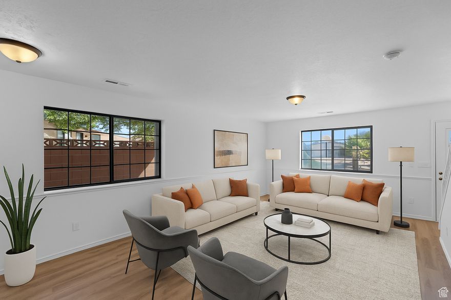 Welcome home to your beautifully updated St. George townhome! This desirable end unit offers privacy, natural light, and modern updates throughout-new flooring, fresh paint, updated lighting, and brand-new kitchen appliances. Perfectly situated near local shops, restaurants, and outdoor recreation, it's the ideal blend of comfort, convenience, and low-maintenance living.