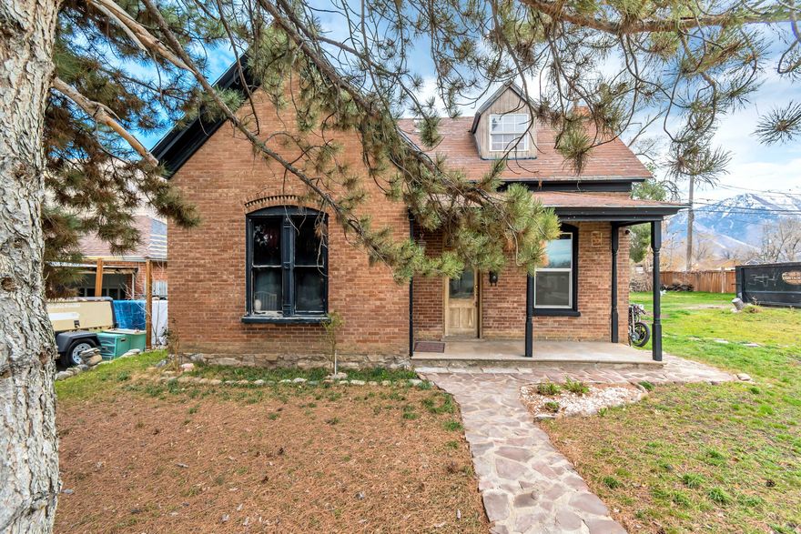 Loaded with charm and character, this inviting 2bedroom, 2bath home features high ceilings and a spacious layout with plenty of potential to make it your own. The property sits on a large lot and includes a storage shed/workshop with an underground cellar, offering added functionality and storage. Centrally located, this home provides both convenience and opportunity.