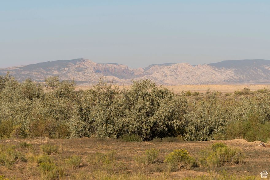 The possibilities are endless with this 93 acres. Located on the outside of Vernal with the most gorgeous unobstructed view of Split Mountain. Zoning on this acreage consists of both Mobile Home Housing and Agricultural. A survey will need to be completed prior to closing. Seller will retain the right to maintain a 33 foot easement. Buyer is to verify all listing information to buyers own satisfaction.