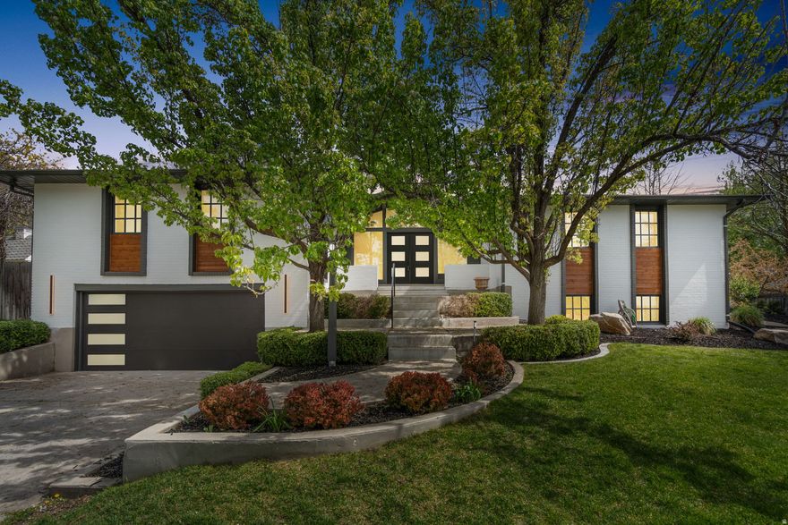 Luxury meets lifestyle at 2234 Willow Brook Way.  Set on Sandy's coveted east bench, this 4 bed, 3.5 bath home blends refined finishes with everyday function-from the designer kitchen and spa-inspired primary suite to the open flow built for entertaining. The lifestyle?  Effortless. Soak in mountain views from the hot tub, host under the stars on the patio, or unwind in the custom-built retreat downstairs. Bonus: a luxe dog bath in the laundry room- because every family member deserves a five-star treatment. A rare balance of luxury, location, and livability- where home feels like your next great chapter.