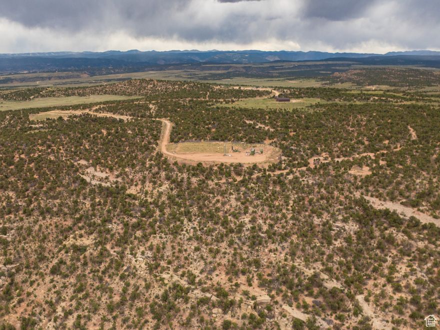 Discover the untamed beauty of the Uintah Basin with this stunning 20-acre wooded parcel, perfectly perched above a scenic draw and surrounded by mature pion pine forest. This rare gem offers a truly private and peaceful setting to build your dream cabin, off-grid hideaway, or recreational retreat-with room to roam and wildlife all around. Watch elk herds traverse the landscape, take in the breathtaking natural vistas, and enjoy all the outdoor adventures the area has to offer. Located near Starvation Reservoir, this parcel provides easy access to fishing, hiking, camping, ATVing, and endless backcountry exploration. This property is also part of a larger opportunity-adjoining parcels are available if you're looking to expand your footprint or create a more secluded ranch or multi-cabin sanctuary:  20 acres adjoining  Parcel ID: 00-0034-1137  40 acres adjoining  Parcel ID: 00-0008-5435  40-acre standalone parcel also available nearby See attached parcel maps and aerial views for layout and proximity. Whether you're seeking solitude, wildlife, or a basecamp for year-round recreation, this land offers the ideal blend of seclusion and adventure. Square footage figures are provided as a courtesy estimate only and were obtained from County Records. Buyer is advised to obtain an independent measurement.