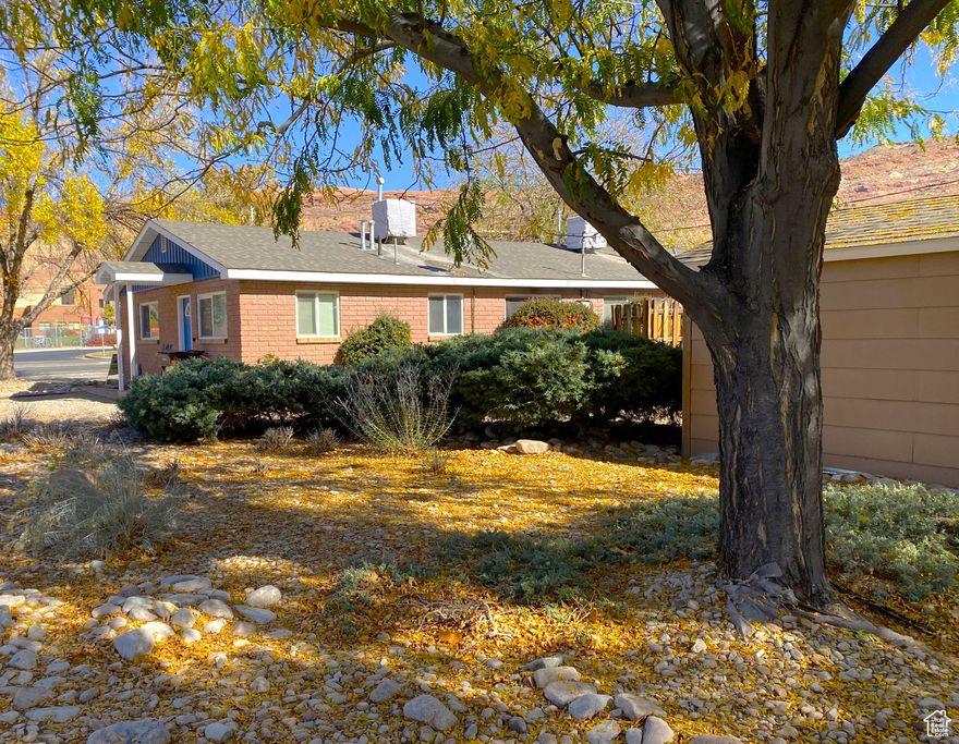 Own your own Moab home! Great in town location near schools, pools, gym, and Park. 2 bed 1 bath starter home or investment property priced to sell. Cute townhome with sturdy and attractive brick exterior. Dedicated parking, storage, and outdoor space is included. Great for corporate employee housing or for individual owner occupant. HOA pays for grounds keeping in the common areas plus water, sewer and weekly trash service. Owners are responsible for maintaining their private outdoor spaces.